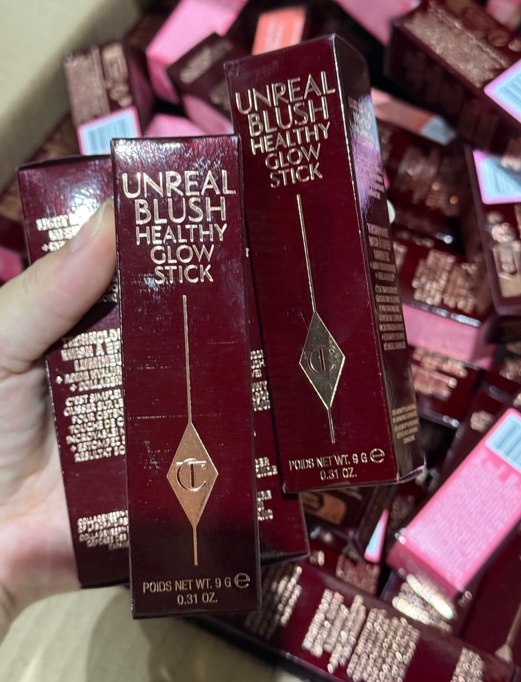 Charlotte Tilbury Unreal Lip + Cheek Glow Blush Stick with Hyaluronic Acid