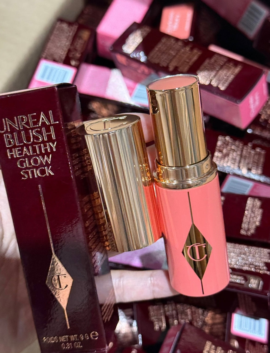 Charlotte Tilbury Unreal Lip + Cheek Glow Blush Stick with Hyaluronic Acid