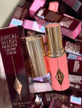 Charlotte Tilbury Unreal Lip + Cheek Glow Blush Stick with Hyaluronic Acid